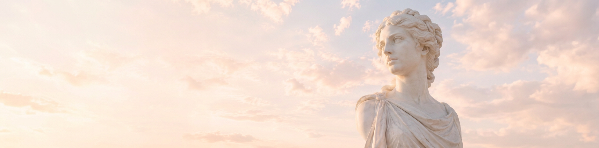 Sunlit marble female sculpture under an open sky